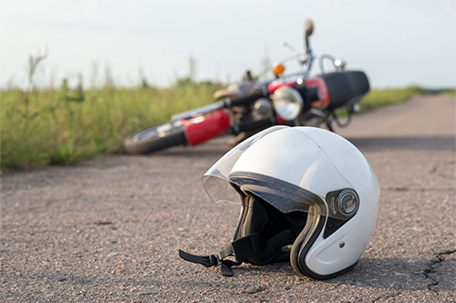 motorcycle accident on side of the road